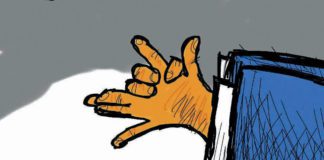 CARTOON: “Putin’s Puppet” CARTOON: "Putin's Puppet"