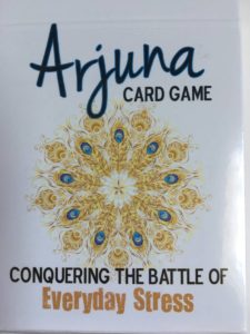 Designed as a mindfulness game to reduce stress, the Arjuna Card Game is a portable non-electronic tool for practicing stress management techniques.
