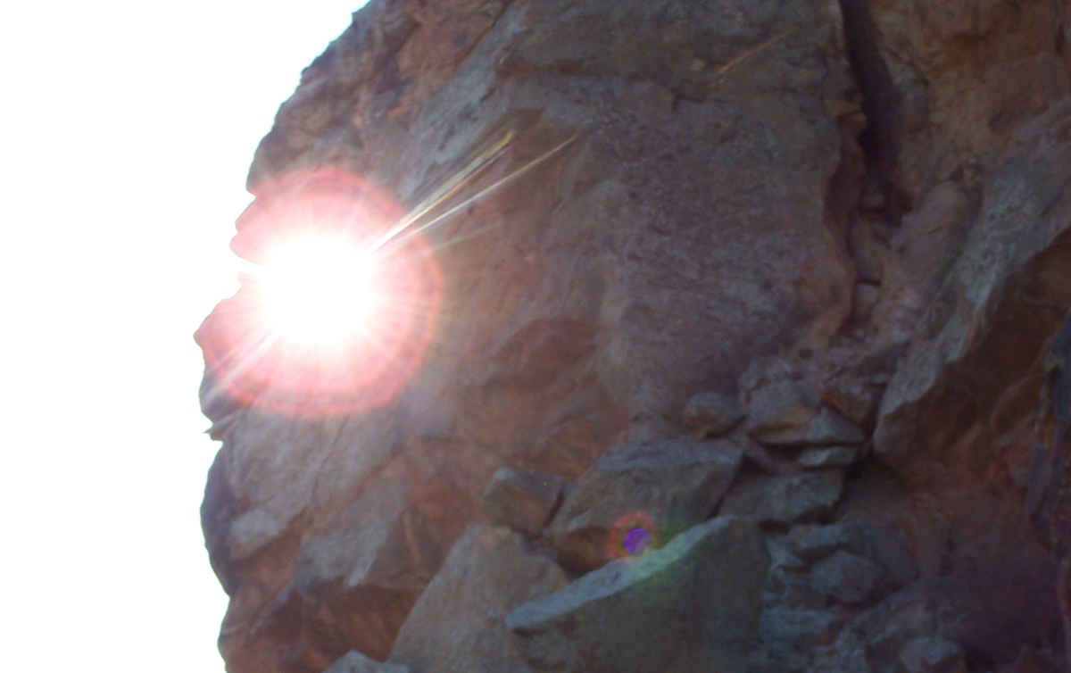 From inside the Parowan Gap, one can observe as the Overseer “spits out the Sun.”
