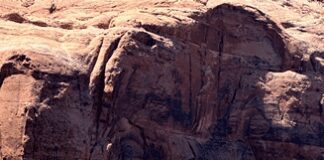 Firefighting Aircraft Draw Water from Lake Powell Super Scooper aircraft drawing water from Lake Powell during past wildfire response.