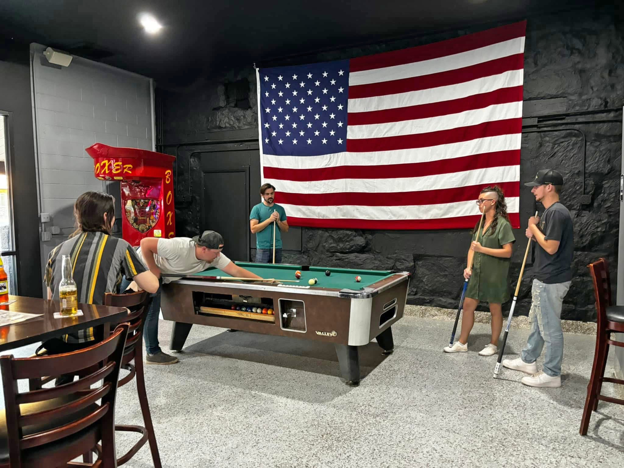 The Garage Bar brings new energy to Colorado City, transforming a historic 1930s garage into a friendly “five-star dive bar” and symbol of Short Creek’s changing community.