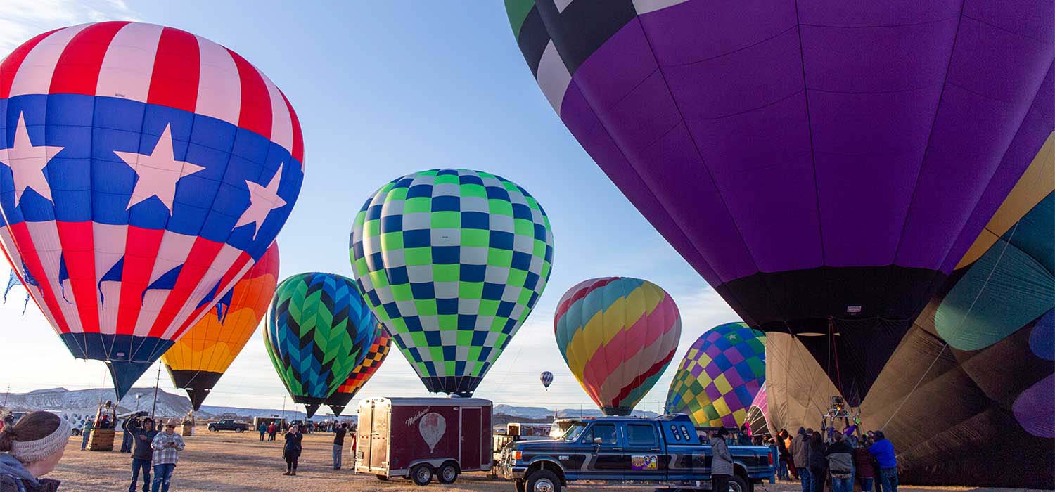 The Up & Away Hot Air Balloon Festival returns to Washington, UT Jan. 16–17 with balloon launches, tethered rides, vendor fairs, entertainment, and evening balloon glows.